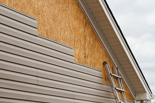 Professional Siding Replacement technician working in Barberton, WA